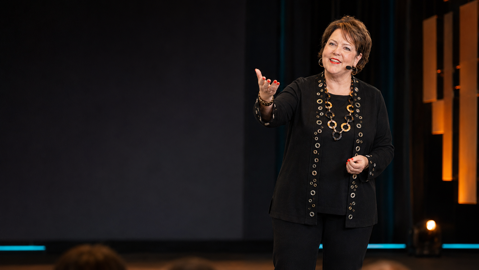 Denise Gabel delivering a keynote